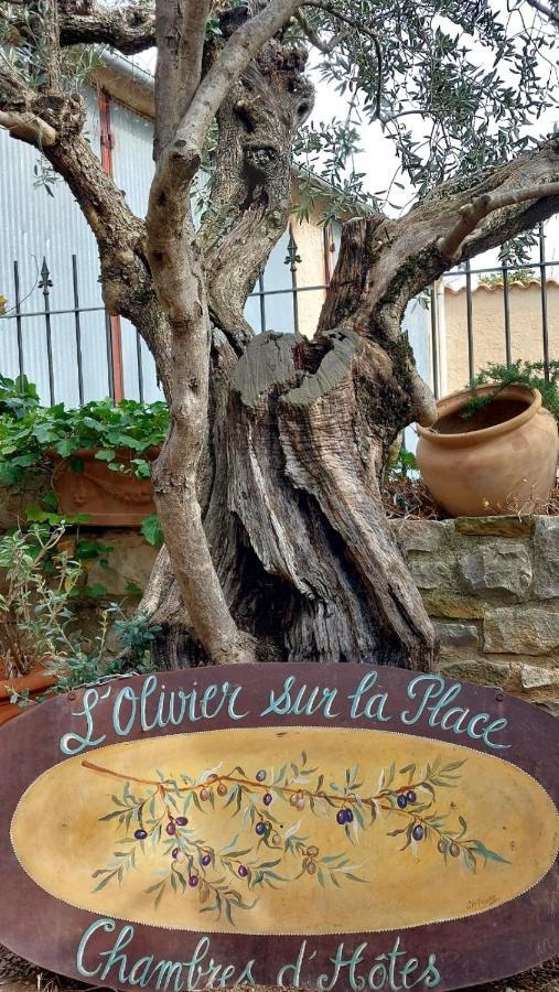 L'Olivier Sur La Place La Rochegiron Esterno foto